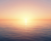 Golden Hawaiian sunrise over a calm ocean