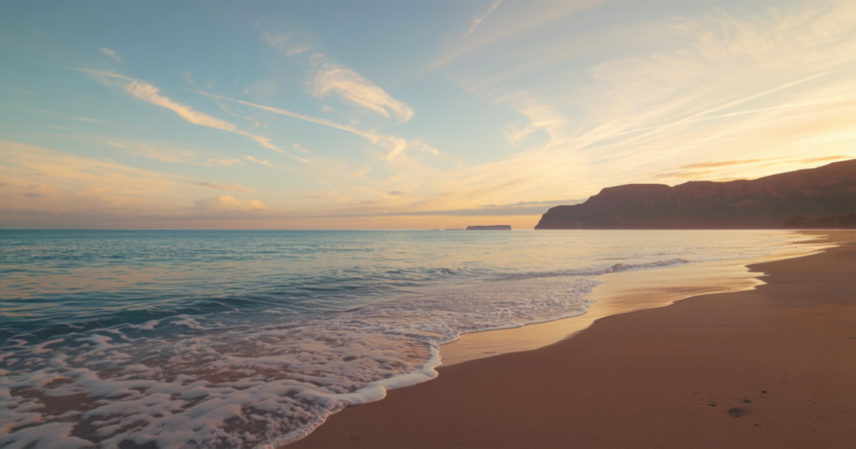 Calm Hawaiian shoreline at soft dawn light